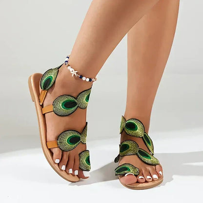 Sandalias planas color pavo real