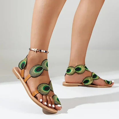 Sandalias planas color pavo real